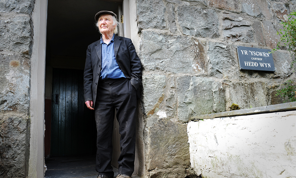 Gerald Williams standing at Yr Ysgwrn's front door