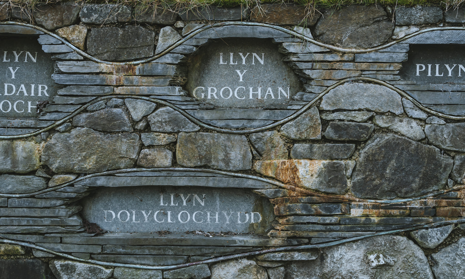 Welsh language lake names carved into stone