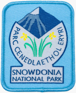 Sew-on fabric Logo Badge