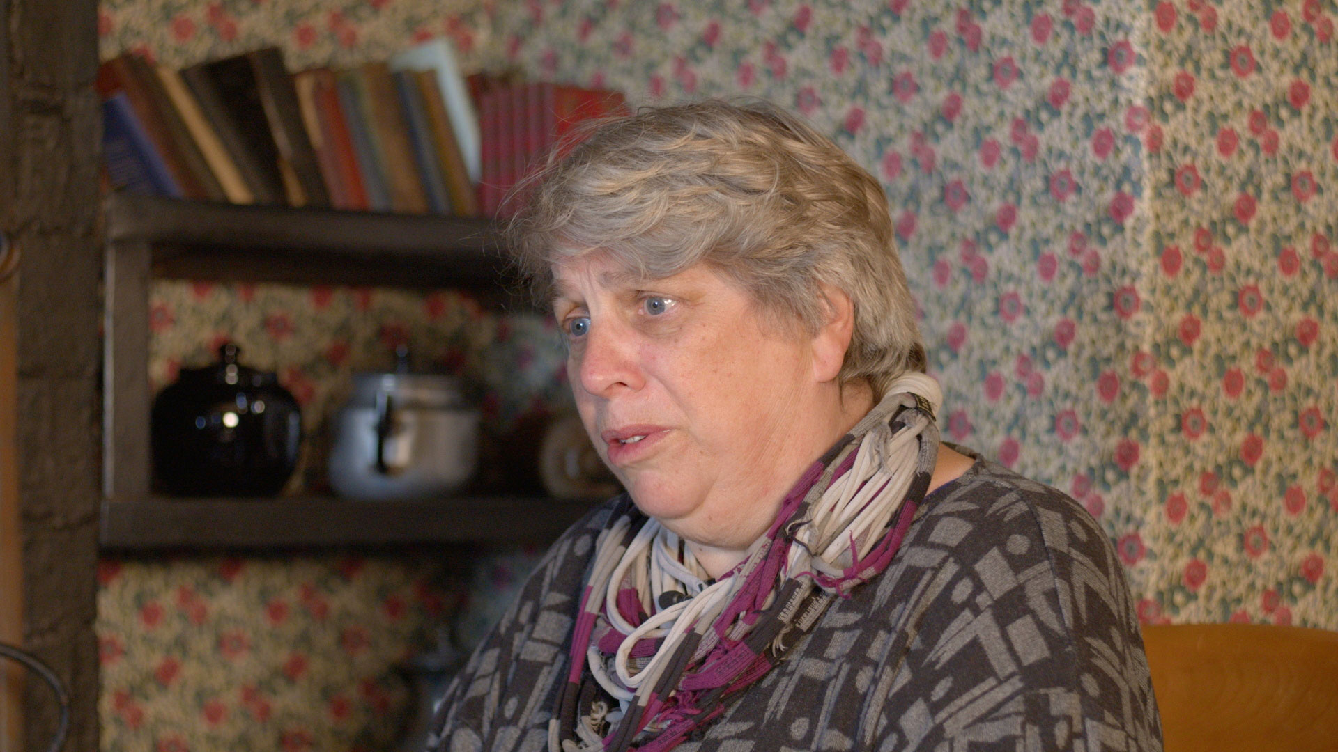 A still from a video of Mair Tomos Ifans reciting a story at Yr Ysgwrn.